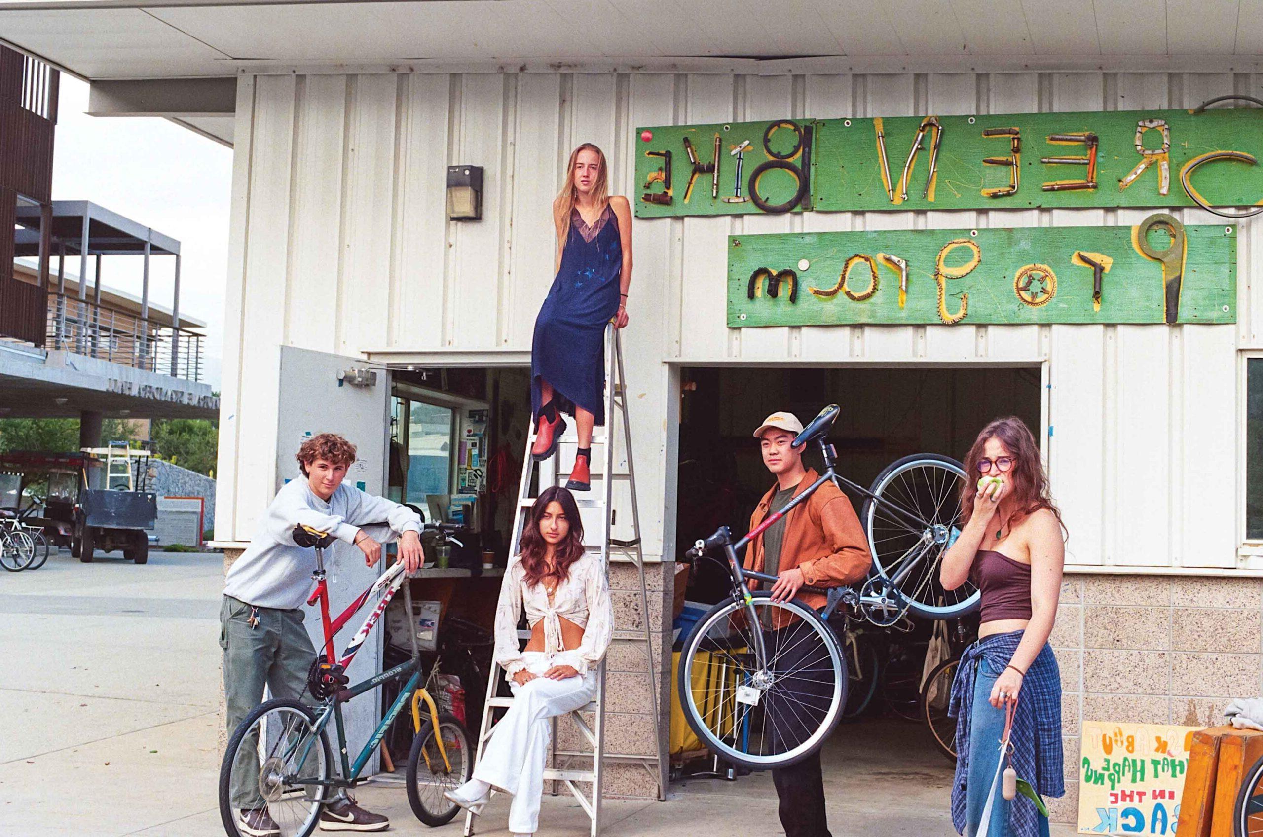 Pz thread members pose in front of the green bike program buildng.